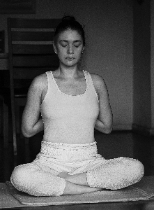 Woman sitting white black Photo