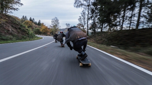 Longboarding longboard boardsport skateboarding equipment Photo