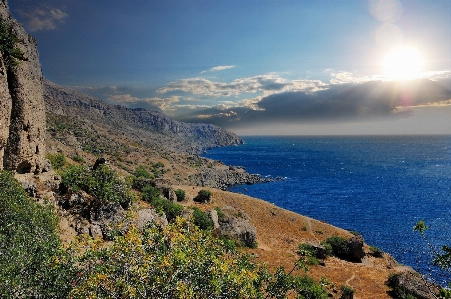 Body of water coast sky nature Photo