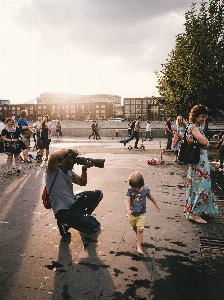 People crowd public space sky Photo