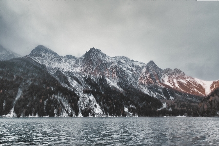 Mountain mountainous landforms range water Photo