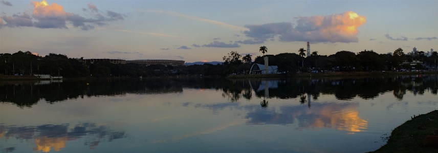 Sunset lake church saint francis of assisi Photo