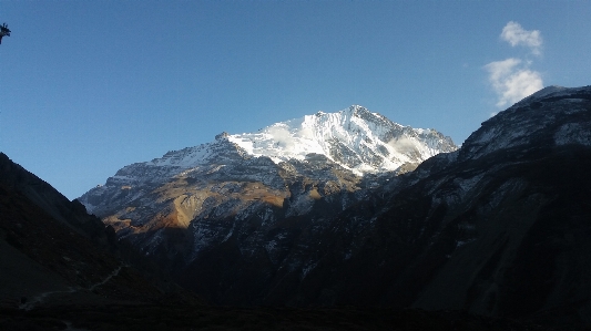 Mountainous landforms mountain range sky Photo