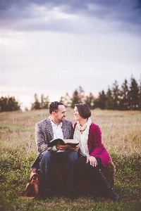 People in nature photograph sitting photography Photo