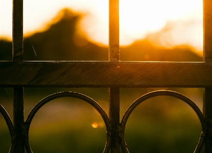 Foto Pôr do sol luz solar hora dourada
 portão