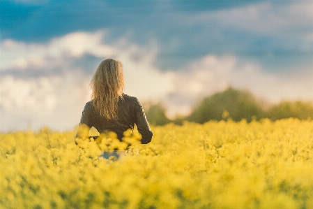 People in nature yellow rapeseed sky Photo