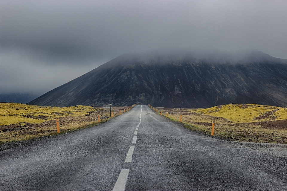 Highland road mountainous landforms sky