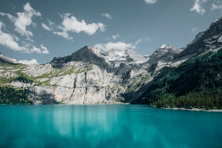 Mountain mountainous landforms body of water nature Photo