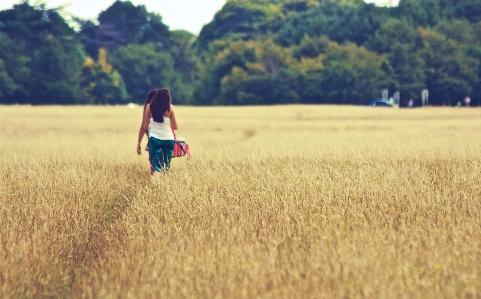 People in nature field photograph grass Photo