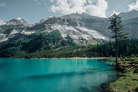 Mountain mountainous landforms body of water nature Photo