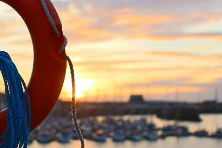 Foto Cielo acqua giallo tramonto