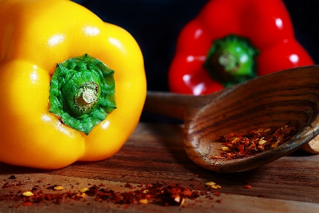 Gastronomy bell pepper spices wooden spoon Photo