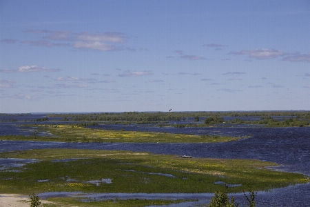 Landscape river valley boat Photo