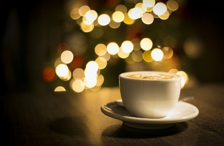 Coffee mug cozy bokeh Photo