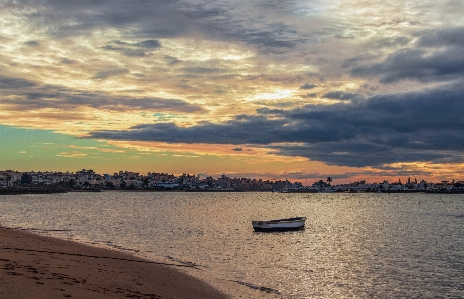 Empty boat sky cloud Photo