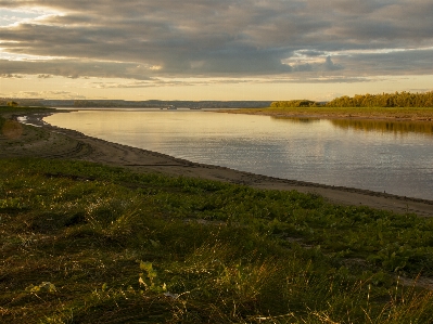 River grass sky sunset Photo