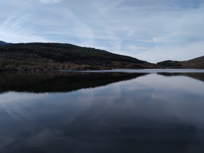 Reflection body of water highland sky Photo