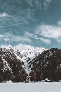 Mountainous landforms mountain snow sky Photo