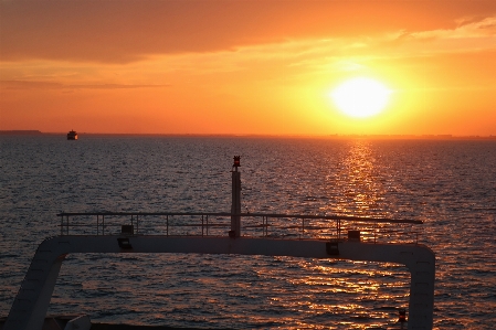 Foto Alba paesaggio marino
 orizzonte cielo