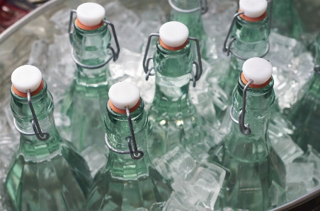 Green bottle water glass Photo