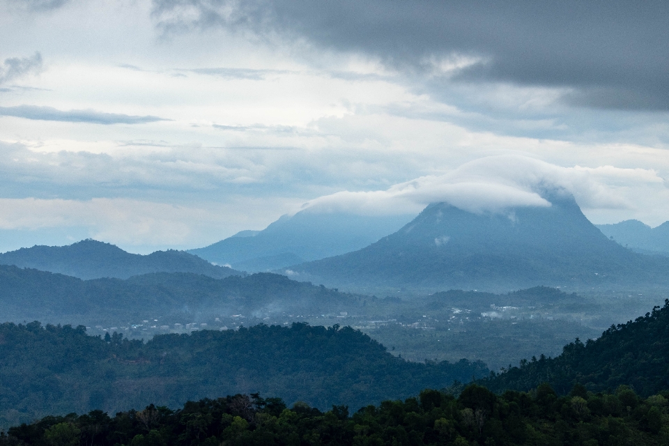 Hill cloudy mountainous landforms sky