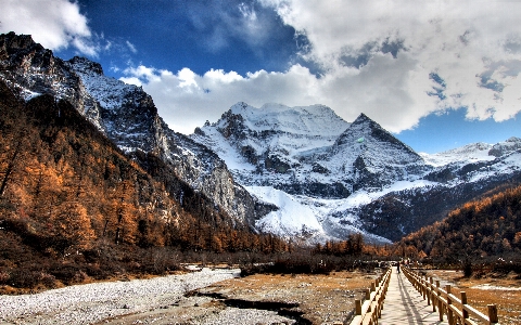 Cool mountainous landforms mountain range winter Photo