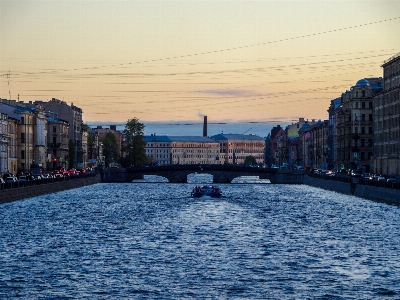 River ship wires houses Photo