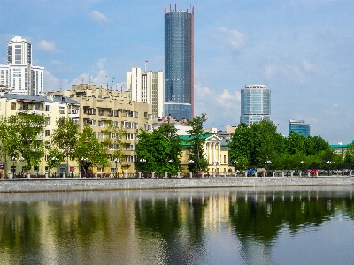 Skyscraper buildings river reflection Photo