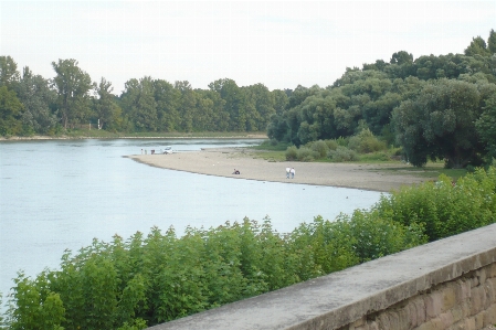 Retaining wall dam river gravel Photo