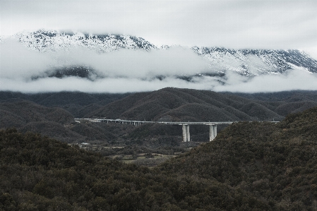 Mountainous landforms highland bridge atmospheric phenomenon Photo