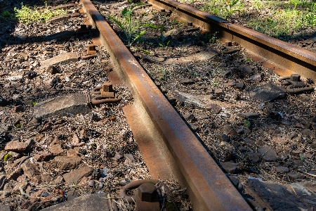 Narrow gauge railway rails rusty spring Photo