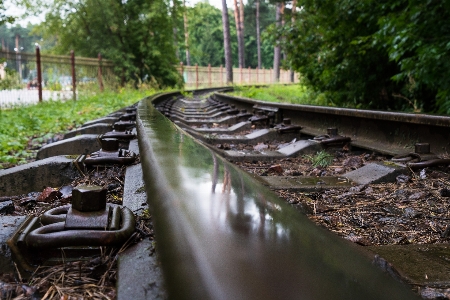 Narrow gauge railway rails rusty spring Photo