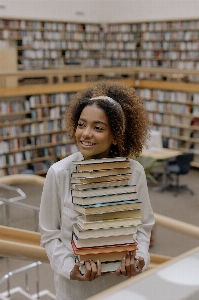 Woman smile shelf customer Photo