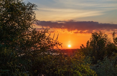 Sun goes down cloud sky Photo