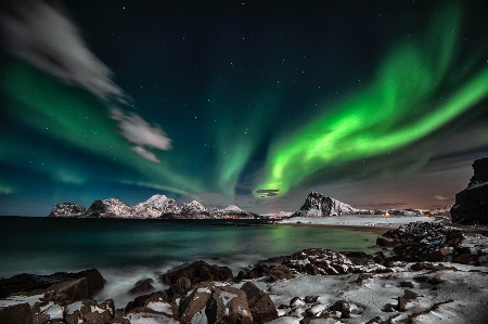 Northern lights mountains water cloud Photo