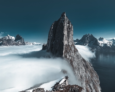 Mountains clouds sky atmosphere Photo