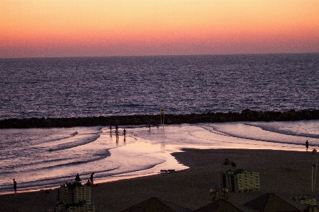 Sunset beach reflection water Photo