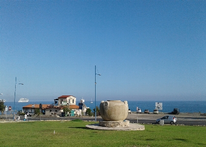 Foto Cielo mar casas viejas
 carros