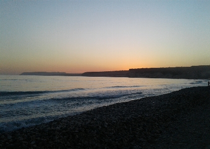 Sunset sea coast beach Photo