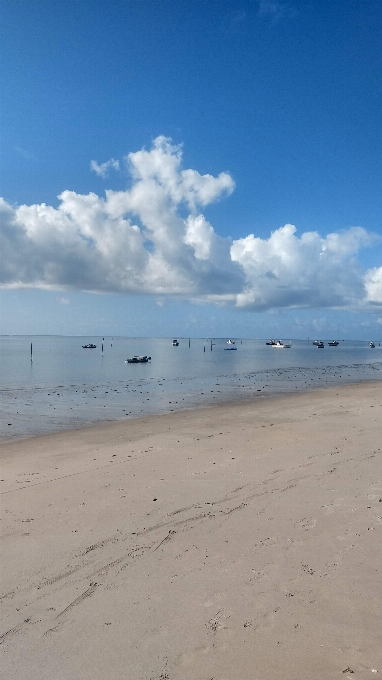 Beach sea land cloud