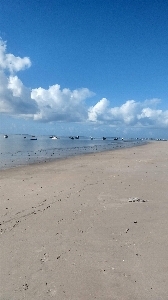 Beach sea land cloud Photo