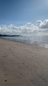 Beach sea land cloud Photo