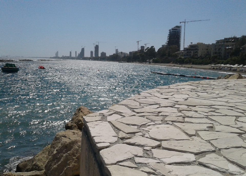 Sky sea rocks jetty