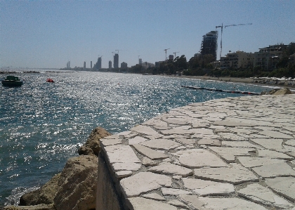 Sky sea rocks jetty Photo