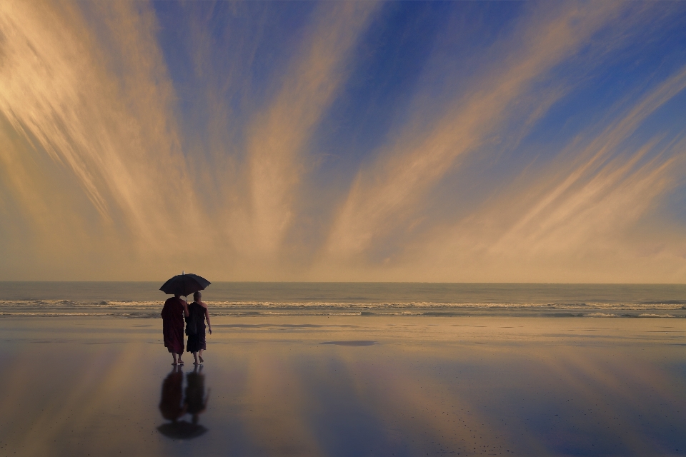 Beach reflection monk buddhist