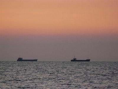 Sea sunset cargo transportation port Photo