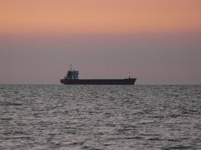 Sea sunset cargo transportation port Photo