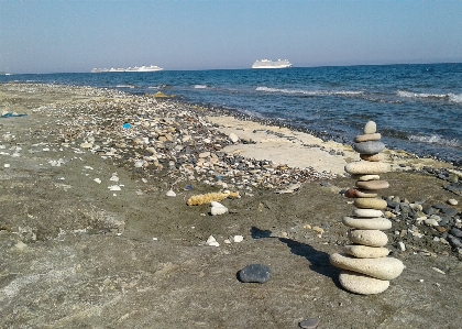 Sky sea water gravel Photo