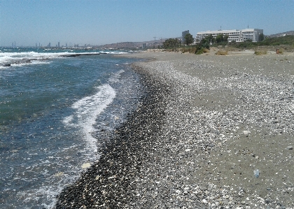 Sky sea sand rocky Photo