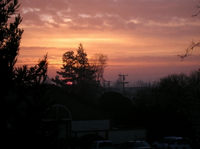 Sunset suburban tiny sun disk cloud Photo